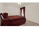 A cozy bedroom with soft lighting and plush bedding at 4393 S Devon Ct, Kissimmee, FL 34746