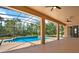 Inviting screened-in pool area features a sparkling pool, perfect for relaxation and outdoor enjoyment at 4393 S Devon Ct, Kissimmee, FL 34746