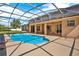 Gorgeous pool with screened enclosure allows for all-weather enjoyment and backyard entertainment at 4393 S Devon Ct, Kissimmee, FL 34746