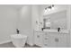 Bathroom with freestanding tub, double sink vanity, and modern black fixtures at 4761 Sw 142Nd Place Rd, Ocala, FL 34473