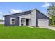 Charming single-story house with a combination of modern design and curb appeal at 4761 Sw 142Nd Place Rd, Ocala, FL 34473