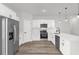 Modern kitchen featuring stainless steel appliances and white cabinetry and luxury countertops at 4761 Sw 142Nd Place Rd, Ocala, FL 34473
