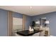 Elegant dining room with a modern table, chairs, neutral decor, and natural light, creating an inviting atmosphere at 4839 Sunflower St, Lake Hamilton, FL 33851
