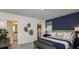 Comfortable main bedroom with a large bed, ensuite bathroom, and walk-in closet at 4839 Sunflower St, Lake Hamilton, FL 33851