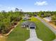 Charming single-story home with a well-maintained lawn, a dark roof, and an attached two-car garage in a peaceful neighborhood at 531 Marion Oaks Blvd, Ocala, FL 34473