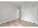 Vacant bedroom with closet doors and wood-look flooring at 531 Marion Oaks Blvd, Ocala, FL 34473