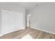 Bedroom with a large closet and wood floors at 531 Marion Oaks Blvd, Ocala, FL 34473