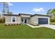 Charming single-story home featuring a well-maintained lawn and a two-car garage at 531 Marion Oaks Blvd, Ocala, FL 34473