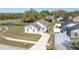 Aerial view of home showcasing the driveway and yard at 605 Swallow Ct, Apopka, FL 32712