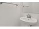Elegant powder room features a modern sink and brushed nickel fixtures at 6239 Woodhaven Village Dr, Port Orange, FL 32128