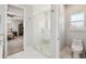 Modern bathroom features a large glass shower and tile flooring at 705 Baffie Ave, Winter Park, FL 32789
