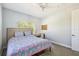 Comfortable bedroom with natural light and desk space at 705 Baffie Ave, Winter Park, FL 32789