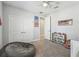 Cozy bedroom featuring plush carpeting and ample storage at 705 Baffie Ave, Winter Park, FL 32789