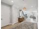 Bright foyer featuring hardwood floors, a decorative rug, and an open staircase to the living room at 705 Baffie Ave, Winter Park, FL 32789