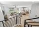 Open concept living room boasts lots of natural light, an L-shaped sofa, and hardwood floors at 705 Baffie Ave, Winter Park, FL 32789