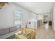Spacious playroom area featuring hardwood floors, a play kitchen, and easy access to other rooms at 705 Baffie Ave, Winter Park, FL 32789