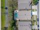 An aerial view showcases the private screened-in pool and backyard of the home at 782 Seneca Meadows Rd, Winter Springs, FL 32708
