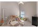 Playful room with play set, a table, and natural lighting at 782 Seneca Meadows Rd, Winter Springs, FL 32708