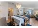 Inviting dining area with stylish chandelier, showcasing the open floor plan and modern design at 782 Seneca Meadows Rd, Winter Springs, FL 32708