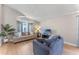 Bright and airy living room with vaulted ceilings and a large window, offering plenty of natural light at 782 Seneca Meadows Rd, Winter Springs, FL 32708