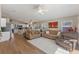 Spacious living area showcasing an open floor plan with a well-appointed kitchen and comfortable seating at 782 Seneca Meadows Rd, Winter Springs, FL 32708