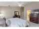 Bright and spacious main bedroom featuring a ceiling fan, and ensuite bathroom at 782 Seneca Meadows Rd, Winter Springs, FL 32708