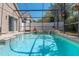 Enjoy the screened-in pool and spa, perfect for relaxation and recreation in your private backyard oasis at 782 Seneca Meadows Rd, Winter Springs, FL 32708