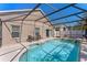 Sun-drenched pool area featuring a spa and comfortable seating, ideal for relaxing and entertaining at 782 Seneca Meadows Rd, Winter Springs, FL 32708