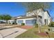 Well-maintained townhomes with manicured lawns, brick driveways, and two-car garages at 9743 Amber Chestnut Way, Winter Garden, FL 34787