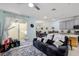 Spacious living area flows into the dining and kitchen areas with natural light at 9743 Amber Chestnut Way, Winter Garden, FL 34787