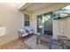 Cozy patio with outdoor seating, brick pavers, and a mounted television creates a relaxing outdoor space at 9743 Amber Chestnut Way, Winter Garden, FL 34787