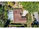 Aerial view of a single Gathering home with a screened-in pool and a circular driveway at 10116 Pointview Ct, Orlando, FL 32836
