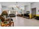 Spacious living room with high ceilings, tile flooring, and many large windows at 10116 Pointview Ct, Orlando, FL 32836