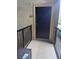 Front door entrance with a railing for unit #220 at 102 Vista Verdi Cir # 220, Lake Mary, FL 32746