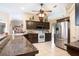 Gourmet kitchen features granite countertops, stainless steel appliances, and stylish cabinetry at 11139 Crooked River Ct, Clermont, FL 34711