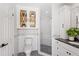 Modern bathroom with glass shower, and storage shelves at 116 E Cottesmore Cir, Longwood, FL 32779