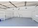 The garage has built in shelving and a durable epoxy floor at 116 E Cottesmore Cir, Longwood, FL 32779