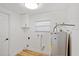 This laundry room features a new water heater, storage cabinet, and neutral paint at 116 E Cottesmore Cir, Longwood, FL 32779