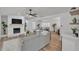 Spacious living room with hardwood floors, fireplace, and an open-concept design at 116 E Cottesmore Cir, Longwood, FL 32779