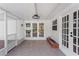 Enclosed patio with brick accents and access to backyard at 116 E Cottesmore Cir, Longwood, FL 32779