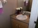 Cozy bathroom features granite countertop, decorative mirror, and ample lighting to add style at 1285 S South Beach Circle Cir, Kissimmee, FL 34746