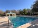 Enjoy this well-maintained neighborhood pool with clubhouse and lounge chairs at 13422 Exbury Ln, Windermere, FL 34786