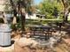 Outdoor picnic area with tables and charcoal grills, perfect for hosting gatherings at 13422 Exbury Ln, Windermere, FL 34786