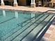 Community swimming pool with clear, inviting water and easy entry steps at 13422 Exbury Ln, Windermere, FL 34786