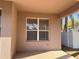 Exterior view of the home's covered porch, with a window at 13422 Exbury Ln, Windermere, FL 34786