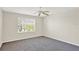 Bedroom with carpet, ceiling fan, and window with blinds at 14740 Hartford Run Dr, Orlando, FL 32828