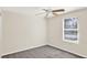 Bedroom with carpet, ceiling fan, and window with blinds at 14740 Hartford Run Dr, Orlando, FL 32828