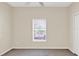 Bedroom with carpet, ceiling fan, window, and closet with standard door at 14740 Hartford Run Dr, Orlando, FL 32828