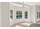 Charming breakfast nook with pool view, tile floors, and natural light at 14740 Hartford Run Dr, Orlando, FL 32828
