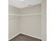 Walk-in closet with carpet flooring, white walls and wire shelving at 14740 Hartford Run Dr, Orlando, FL 32828